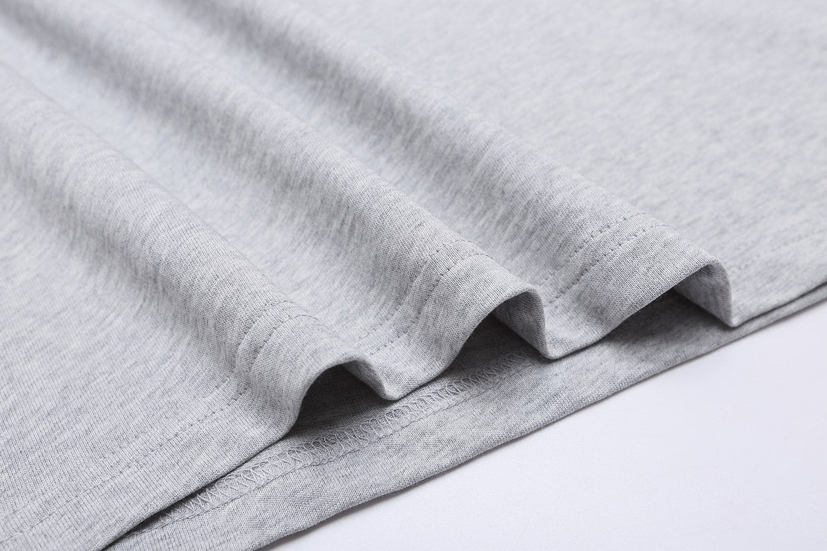 ESSENTIALS Repeated Graphic Short-Sleeve T-Shirt — detail